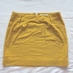 Mustard yellow mini skirt